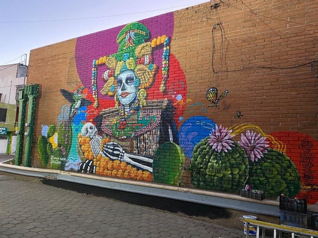 Catrina con cactus y colibrí